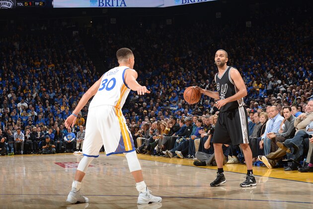 OAKLAND, CA - JANUARY 25:  Tony Parker #9 of the San Antonio Spurs handles the ball against Stephen Curry #30 of the Golden State Warriors on January 25, 2016 at ORACLE Arena in Oakland, California. NOTE TO USER: User expressly acknowledges and agrees that, by downloading and or using this photograph, user is consenting to the terms and conditions of Getty Images License Agreement. Mandatory Copyright Notice: Copyright 2016 NBAE (Photo by Noah Graham/NBAE via Getty Images)