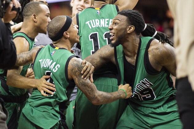 CLEVELAND, OH - FEBRUARY 5: Isaiah Thomas #4 of the Boston Celtics celebrates with Jae Crowder #99 after winning the game against the Cleveland Cavaliers at Quicken Loans Arena on February 5, 2016 in Cleveland, Ohio. The Celtics defeated the Cavaliers 104-103. NOTE TO USER: User expressly acknowledges and agrees that, by downloading and/or using this photograph, user is consenting to the terms and conditions of the Getty Images License Agreement. Mandatory copyright notice. (Photo by Jason Miller/Getty Images)