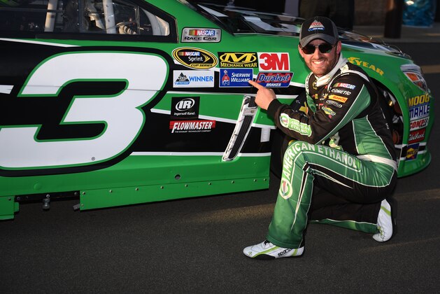 FONTANA, CA - MARCH 18:  Austin Dillon, driver of the #3 American Ethanol Chevrolet, poses with his car after winning the pole award during qualifying for the NASCAR Sprint Cup Series Auto Club 400 at Auto Club Speedway on March 18, 2016 in Fontana, California.  (Photo by Jonathan Moore/Getty Images)