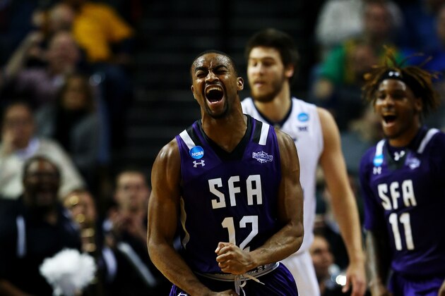 NEW YORK, NY - MARCH 18:  Dallas Cameron #12 of the Stephen F. Austin Lumberjacks celebrates in the second half against the West Virginia Mountaineers during the first round of the 2016 NCAA Men's Basketball Tournament at Barclays Center on March 18, 2016 in the Brooklyn borough of New York City.  (Photo by Elsa/Getty Images)