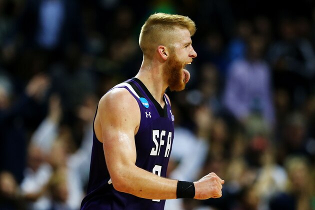 NEW YORK, NY - MARCH 18:  Thomas Walkup #0 of the Stephen F. Austin Lumberjacks reacts in the second half against the West Virginia Mountaineers during the first round of the 2016 NCAA Men's Basketball Tournament at Barclays Center on March 18, 2016 in the Brooklyn borough of New York City.  (Photo by Elsa/Getty Images)