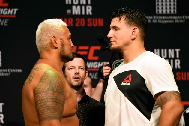 BRISBANE, AUSTRALIA - MARCH 19:   (L-R) Opponents Mark Hunt of New Zealand and Frank Mir face off during the UFC Fight Night weigh-in at the Brisbane Entertainment Centre on March 19, 2016 in Brisbane, Australia. (Photo by Josh Hedges/Zuffa LLC/Zuffa LLC via Getty Images)