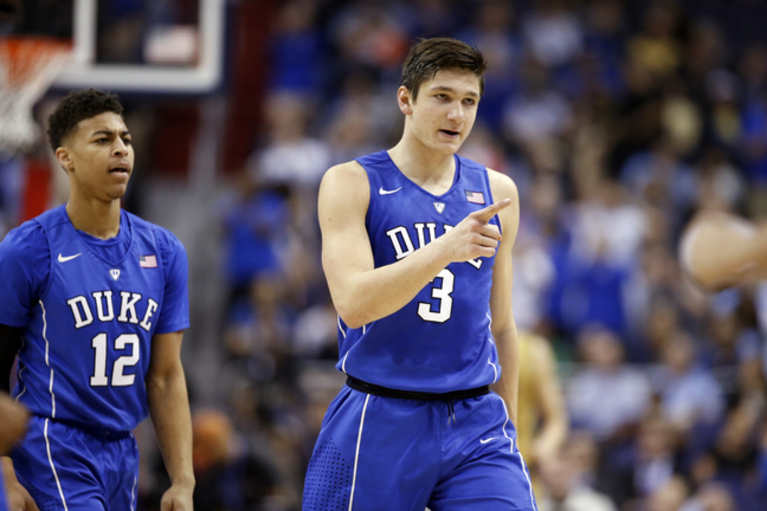 Duke guard Derryck Thornton (12) and Duke guard Grayson Allen (3) react as they walk to the bench for a time out during the first half of an NCAA college basketball game in the Atlantic Coast Conference tournament against Notre Dame, Thursday, March 10, 2016, in Washington. (AP Photo/Alex Brandon)