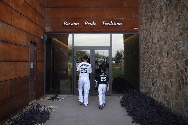Chicago White Sox's Adam LaRoche, left, and his son Drake walk into the White Sox clubhouse during a photo day before a baseball spring training workout, Saturday, Feb. 28, 2015 in Phoenix. (AP Photo/John Locher) Chicago White Sox's Adam LaRoche, left, and his son Drake walk into the White Sox clubhouse during a photo day before a baseball spring training workout, Saturday, Feb. 28, 2015 in Phoenix. (AP Photo/John Locher)
