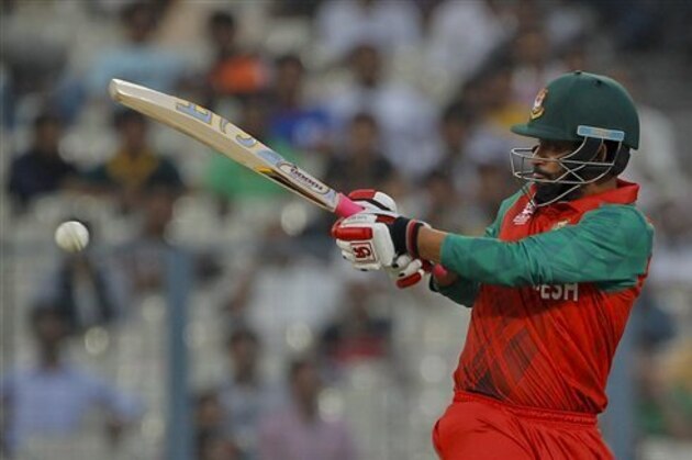 Bangladesh's Tamim Iqbal bats against Pakistan during their ICC World Twenty20 2016 cricket match in Kolkata, India, Wednesday, March 16, 2016. (AP Photo/ Bikas Das)