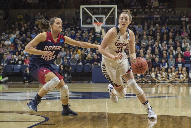 Mar 19, 2016; Storrs, CT, USA; Connecticut Huskies guard/forward Katie Lou Samuelson (33) drives to the basket against Robert Morris Colonials guard Lou Mataly (12) during the first half at Gampel Pavilion. Mandatory Credit: Gregory J. Fisher-USA TODAY Sports