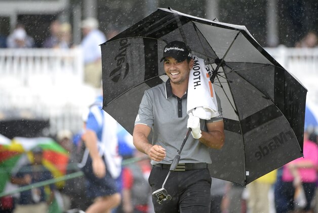 Jason Day, of Australia, reacts after hitting out of a bunker onto the ninth green during the third round of the Arnold Palmer Invitational golf tournament in Orlando, Fla., Saturday, March 19, 2016. (AP Photo/Phelan M. Ebenhack)