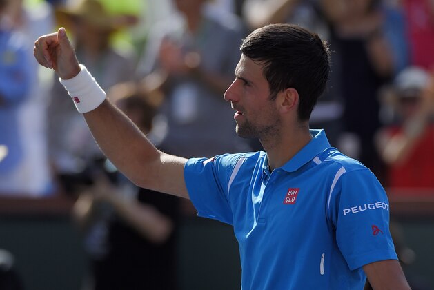 Novak Djokovic, of Serbia, celebrates after defeating Rafael Nadal, of Spain, in a semifinal at the BNP Paribas Open tennis tournament, Saturday, March 19, 2016, in Indian Wells, Calif. Djokovic won 7-6 (5), 6-2. (AP Photo/Mark J. Terrill)