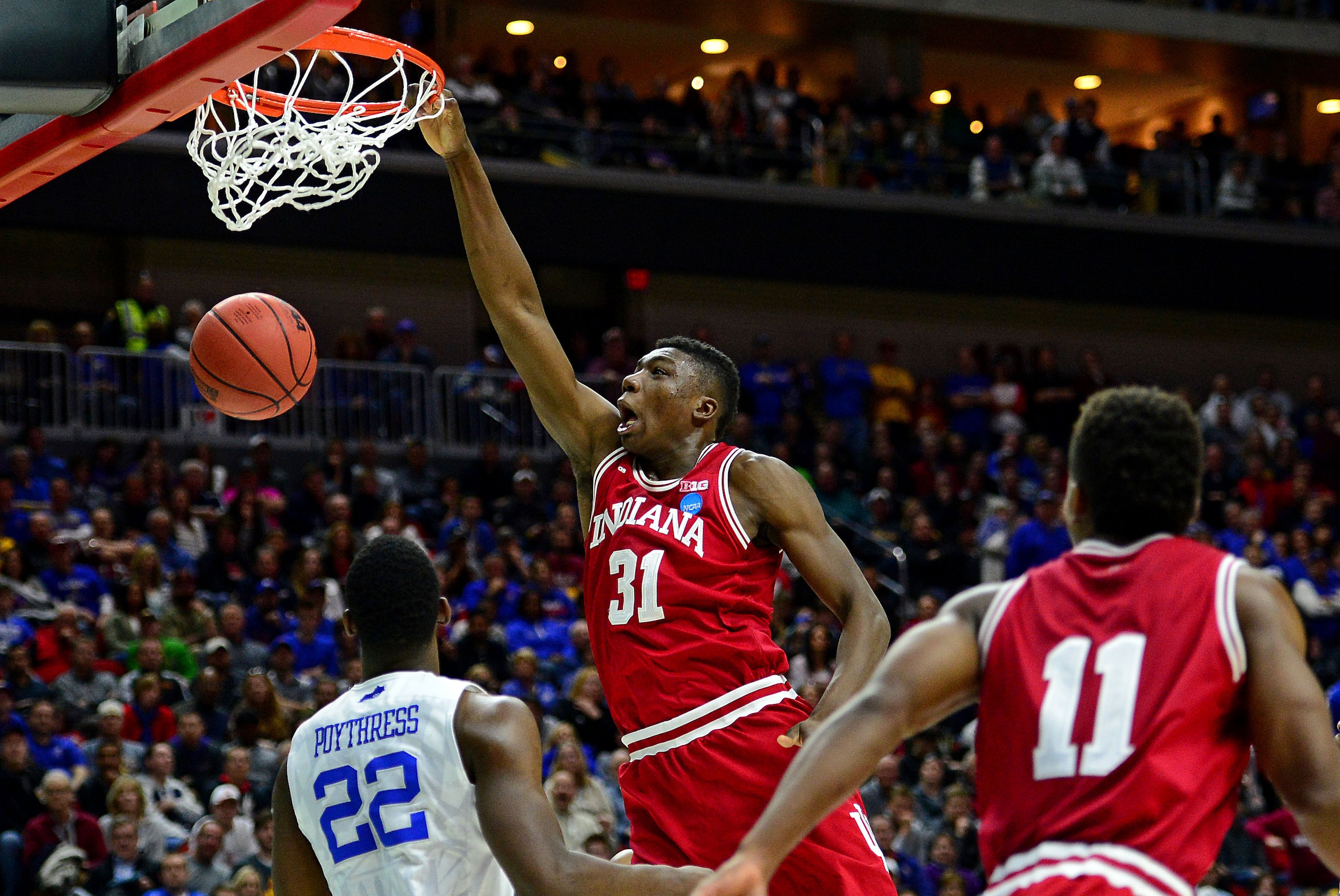 Mar 19, 2016; Des Moines, IA, USA; Indiana Hoosiers center Thomas Bryant (31) dunks the ball against Kentucky Wildcats forward Alex Poythress (22) in the second half during the second round of the 2016 NCAA Tournament at Wells Fargo Arena. Mandatory Credit: Jeffrey Becker-USA TODAY Sports
