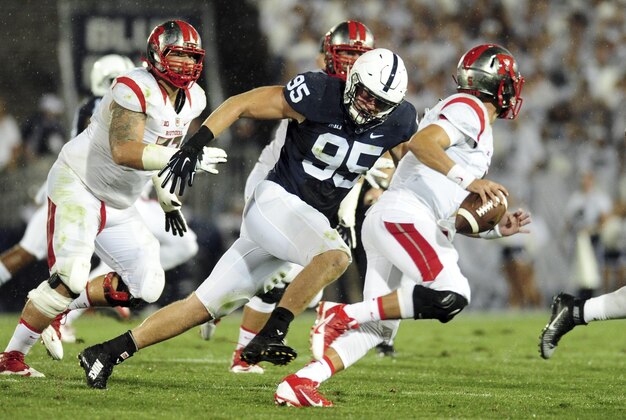 Sep 19, 2015; University Park, PA, USA; Rutgers Scarlet Knights quarterback Chris Laviano (5) is pressured by Penn State Nittany Lions defensive end Carl Nassib (95) in the second quarter at Beaver Stadium. Mandatory Credit: Evan Habeeb-USA TODAY Sports Sep 19, 2015; University Park, PA, USA; Rutgers Scarlet Knights quarterback Chris Laviano (5) is pressured by Penn State Nittany Lions defensive end Carl Nassib (95) in the second quarter at Beaver Stadium. Mandatory Credit: Evan Habeeb-USA TODAY Sports