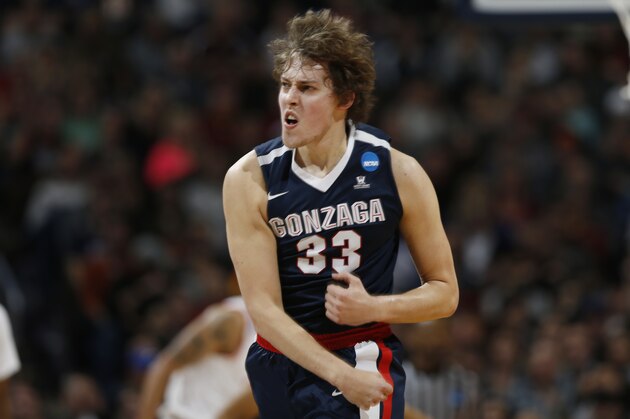 Gonzaga forward Kyle Wiltjer reacts after hitting a 3-point basket against Utah during the first half of a second-round men's college basketball game Saturday, March 19, 2016, in the NCAA Tournament in Denver. (AP Photo/David Zalubowski)
