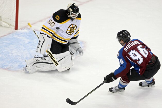 Oct 14, 2015; Denver, CO, USA; Colorado Avalanche right wing Mikko Rantanen (96) has his shot blocked by Boston Bruins goalie Jonas Gustavsson (50) during the first period at Pepsi Center. Mandatory Credit: Chris Humphreys-USA TODAY Sports