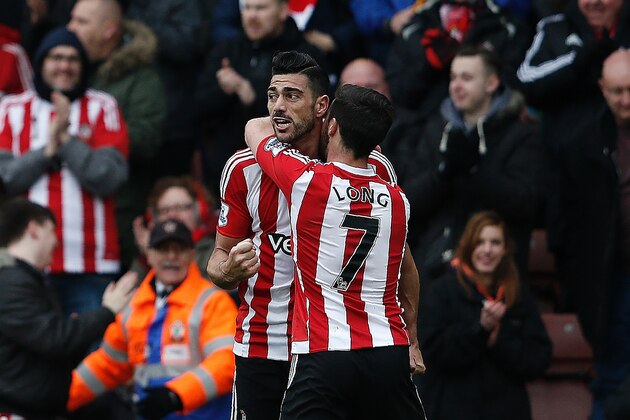 Southampton's Italian striker Graziano Pelle (L) celebrates scoring his team's second goal with Southampton's Irish striker Shane Long during the English Premier League football match between Southampton and Liverpool at St Mary's Stadium in Southampton, southern England on March 20, 2016. / AFP / ADRIAN DENNIS / RESTRICTED TO EDITORIAL USE. No use with unauthorized audio, video, data, fixture lists, club/league logos or 'live' services. Online in-match use limited to 75 images, no video emulation. No use in betting, games or single club/league/player publications. / (Photo credit should read ADRIAN DENNIS/AFP/Getty Images) Southampton's Italian striker Graziano Pelle (L) celebrates scoring his team's second goal with Southampton's Irish striker Shane Long during the English Premier League football match between Southampton and Liverpool at St Mary's Stadium in Southampton, southern England on March 20, 2016. / AFP / ADRIAN DENNIS / RESTRICTED TO EDITORIAL USE. No use with unauthorized audio, video, data, fixture lists, club/league logos or 'live' services. Online in-match use limited to 75 images, no video emulation. No use in betting, games or single club/league/player publications. / (Photo credit should read ADRIAN DENNIS/AFP/Getty Images)