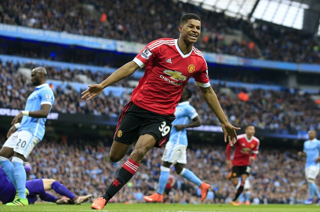 United’s Marcus Rashford celebrates after scoring his side's first goal during the English Premier League soccer match between Manchester City and Manchester United at the Etihad stadium in Manchester, Sunday, March 20, 2016.(AP Photo/Jon Super)