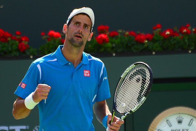 Mar 19, 2016; Indian Wells, CA, USA; Novak Djokovic (SRB) pumps his fist after defeating Rafael Nadal (ESP) in his semifinal match in the BNP Paribas Open at the Indian Wells Tennis Garden. Djokovic won 7-6, 6-3. Mandatory Credit: Jayne Kamin-Oncea-USA TODAY Sports