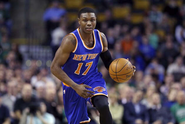 New York Knicks forward Cleanthony Early (17) dribbles up court during the first half of an NBA basketball game against the Boston Celtics in Boston, Wednesday, Feb. 25, 2015. (AP Photo/Elise Amendola)