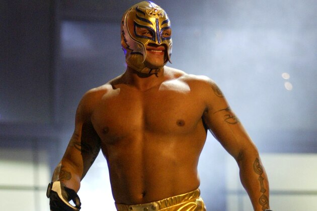 LAS VEGAS - DECEMBER 2:  (U.S. TABLOIDS OUT)   WWE wrestler Rey Mysterio walks on stage during the '1st Annual Video Game Awards' at the MGM Grand Garden Arena December 2, 2003 in Las Vegas, Nevada.  The show premieres on Spike T.V. Thursday, December 4 at 9:00PM ET/PT.  (Photo by Frank Micelotta/Getty Images)