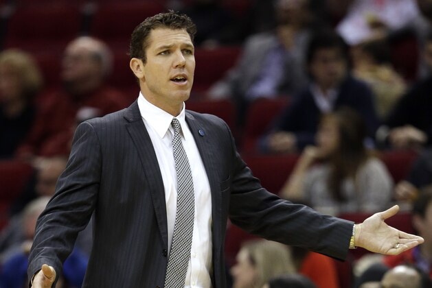 Golden State Warriors' interim coach Luke Walton argues with an official during the first half of an NBA basketball game against the Houston Rockets, Thursday, Dec. 31, 2015, in Houston. (AP Photo/David J. Phillip)