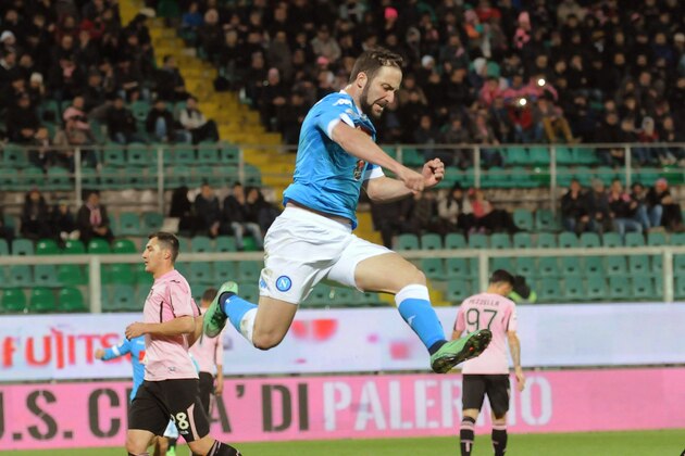 Napoli forward Gonzalo Higuain celebrates after scoring on a penalty kick during the Italian Serie A soccer match between Palermo and Napoli at the Renzo Barbera stadium, in Palermo, Italy, March 13, 2016. (Mike Palazzotto/ANSA via AP Photo) ITALY OUT