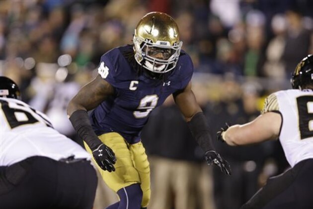 FILE - In this Nov. 14, 2015, file photo, Notre Dame linebacker Jaylon Smith (9) is shown during an NCAA college football game against Wake Forest in South Bend, Ind. Football fans see the NFL’s annual scouting combine as merely a numbers game that comes down to the times, jumps and drills they see on television. NFL executives are more interested in getting behind-the-scenes answers through medical checks and personal interviews. (AP Photo/Michael Conroy, File)