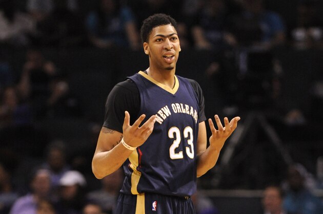 Mar 9, 2016; Charlotte, NC, USA; New Orleans Pelicans forward center Anthony Davis (23) signals over to his bench during the second half of the game against the Charlotte Hornets at Time Warner Cable Arena. The Hornets won 122-113.  Mandatory Credit: Sam Sharpe-USA TODAY Sports