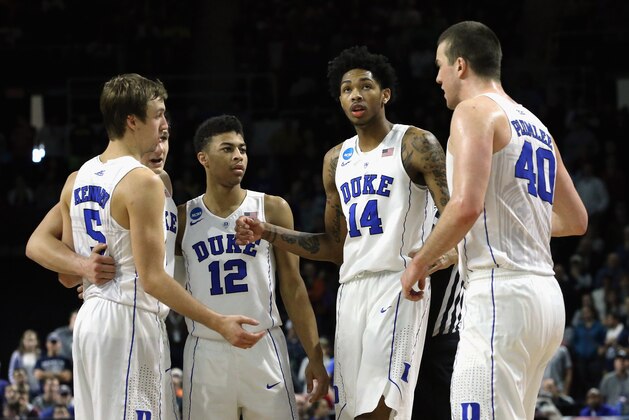 PROVIDENCE, RI - MARCH 19: Luke Kennard #5 of the Duke Blue Devils, Grayson Allen #3, Derryck Thornton #12, Brandon Ingram #14 and Marshall Plumlee #40 huddle together during their game against the Yale Bulldogs during the second round of the 2016 NCAA Men's Basketball Tournament at Dunkin' Donuts Center on March 19, 2016 in Providence, Rhode Island.  (Photo by Jim Rogash/Getty Images)