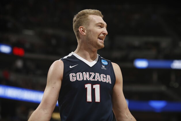 Gonzaga forward Domantas Sabonis smiles near the end of the teams' second-round game against Utah on Saturday, March 19, 2016, in the NCAA men's college basketball tournament in Denver. Gonzaga won 82-59. (AP Photo/David Zalubowski)