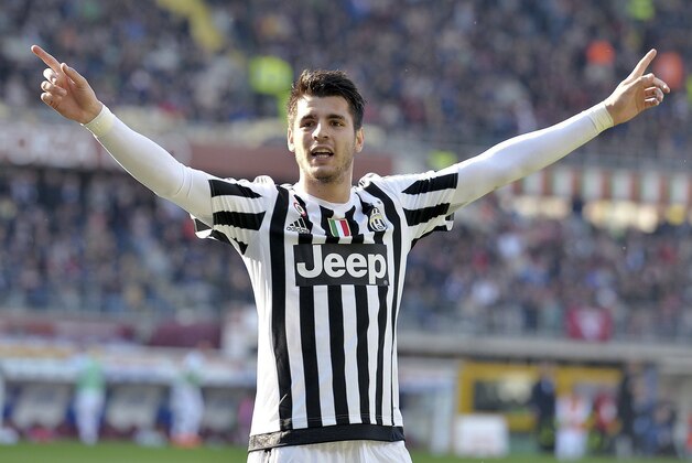 Juventus' Alvaro Morata celebrates after scoring during a Serie A soccer match between Torino and Juventus at Turin's Olympic stadium, Sunday, March 20, 2016. Juventus won 4-1. (Alessandro Di Marco/ANSA via AP)