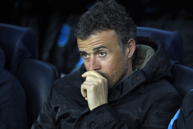 Barcelona's coach Luis Enrique looks on before the UEFA Champions League Round of 16 second leg football match FC Barcelona vs Arsenal FC at the Camp Nou stadium in Barcelona on March 16, 2016.  / AFP / LLUIS GENE        (Photo credit should read LLUIS GENE/AFP/Getty Images)