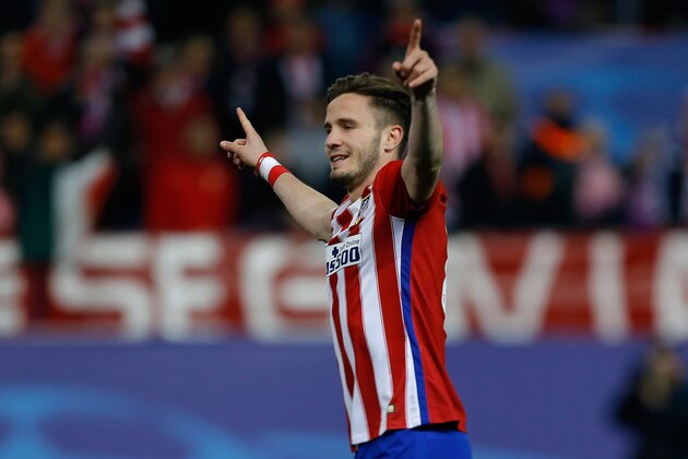 Atletico's Saul Niguez celebrates after scoring  in a penalty shoot out at the end of the Champions League second leg soccer match between Atletico Madrid and PSV Eindhoven at the Vicente Calderon stadium in Madrid, Spain, Tuesday March 15, 2016. Atletico defeated PSV 8-7 in a penalty shoot out after the game ended in a 0-0 draw. (AP Photo/Francisco Seco)