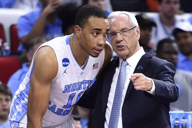 Mar 19, 2016; Raleigh, NC, USA; North Carolina Tar Heels head coach Roy Williams (R) talks to forward Brice Johnson (11) in the second half during the second round of the 2016 NCAA Tournament at PNC Arena. The Tar Heels won 85-66. Mandatory Credit: Bob Donnan-USA TODAY Sports