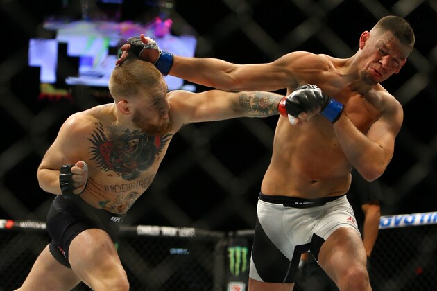 LAS VEGAS, NV - MARCH 5:    Conor McGregor punches Nate Diaz during UFC 196 at the MGM Grand Garden Arena on March 5, 2016 in Las Vegas, Nevada. (Photo by Rey Del Rio/Getty Images)