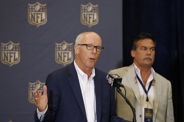 Atlanta Falcons president and CEO Rich McKay, left, answers a question as St. Louis Rams head football coach Jeff Fisher, right, listens during an NFL Competition Committee news conference at the NFL Annual Meeting, Monday, March 23, 2015, in Phoenix. (AP Photo/Ross D. Franklin)