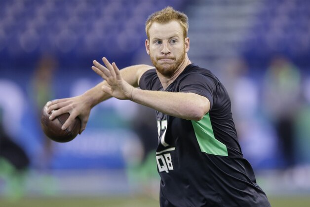 North Dakota State quarterback Carson Wentz runs a drill at the NFL football scouting combine on Saturday, Feb. 27, 2016, in Indianapolis. (AP Photo/Darron Cummings)