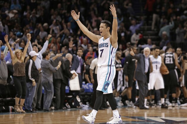 Charlotte Hornets' Jeremy Lin celebrates after an NBA basketball game against the San Antonio Spurs in Charlotte, N.C., Monday, March 21, 2016. The Hornets won 91-88. (AP Photo/Chuck Burton)