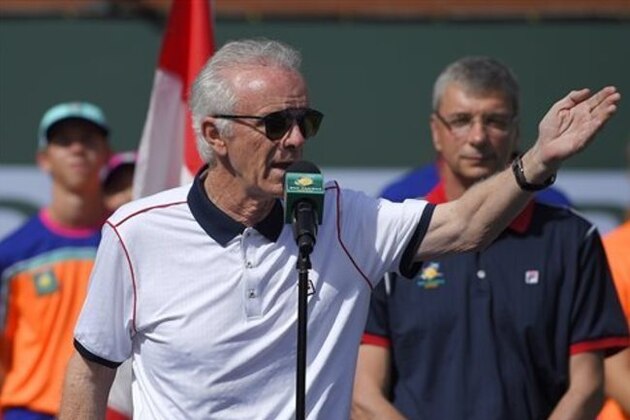 FILE - In this March 20, 2016, file photo, tournament director Raymond Moore gestures while speaking at the BNP Paribas Open tennis tournament in Indian Wells, Calif. The former tournament director at Indian Wells who now runs the WTA Tour calls his successor's critical comments about women's tennis players