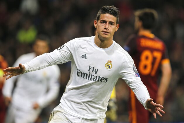 Real Madrid's James Rodriguez celebrates after scoring his team's second goal during the Champions League Round of 16, second leg soccer match between Real Madrid and Roma at the Santiago Bernabeu stadium in Madrid, Tuesday March 8, 2016. (AP Photo/Paul White)