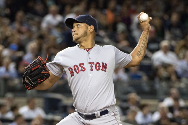Sep 28, 2015; Bronx, NY, USA; Boston Red Sox pitcher Eduardo Rodriguez (52) delivers a pitch during the second inning of the game against the New York Yankees at Yankee Stadium. Mandatory Credit: Gregory J. Fisher-USA TODAY Sports