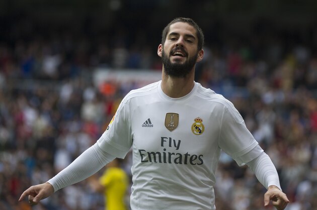 Real Madrid's midfielder Isco celebrates his goal during the Spanish league football match Real Madrid CF vs UD Las Palmas at the Santiago Bernabeu stadium in Madrid on October 31, 2015.   / AFP / CURTO DE LA TORRE        (Photo credit should read CURTO DE LA TORRE/AFP/Getty Images)