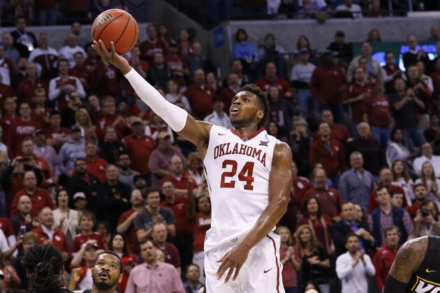 Oklahoma guard Buddy Hield (24) goes up for a basket against VCU in the second half during a second-round men's college basketball game in the NCAA Tournament in Oklahoma City, Sunday, March 20, 2016. Oklahoma won 85-81. (AP Photo/Alonzo Adams)