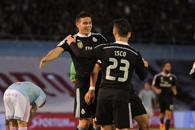VIGO, SPAIN - APRIL 26:  James Rodriguez of Real Madrid celebrates with Isco after scoring Real's 3rd goal during the La Liga match between Celta Vigo and Real Madrid CF at Estadio Balaidos on April 26, 2015 in Vigo, Spain.  (Photo by Denis Doyle/Getty Images)