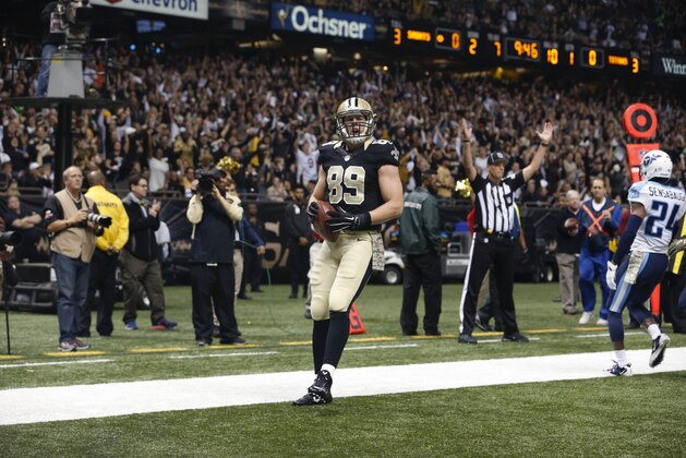 New Orleans Saints tight end Josh Hill (89) reacts after his touchdown reception as Tennessee Titans cornerback Coty Sensabaugh (24) covers in the first half of an NFL football game in New Orleans, Sunday, Nov. 8, 2015. (AP Photo/Jonathan Bachman) New Orleans Saints tight end Josh Hill (89) reacts after his touchdown reception as Tennessee Titans cornerback Coty Sensabaugh (24) covers in the first half of an NFL football game in New Orleans, Sunday, Nov. 8, 2015. (AP Photo/Jonathan Bachman)