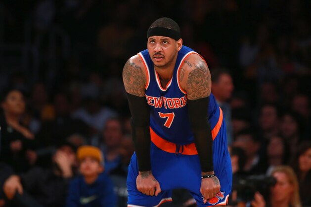 LOS ANGELES, CA - MARCH 13:  Carmelo Anthony #7 of the New York Knicks looks on during a break in NBA game action against the Los Angeles Lakers at Staples Center on March 13, 2016 in Los Angeles, California. The Knicks defeated the Lakers 90-87. NOTE TO USER: User expressly acknowledges and agrees that, by downloading and or using this photograph, User is consenting to the terms and conditions of the Getty Images License Agreement.  (Photo by Victor Decolongon/Getty Images)