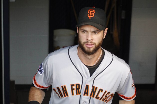 Aug 21, 2015; Pittsburgh, PA, USA; San Francisco Giants first baseman Brandon Belt (9) enters the dugout to play the Pittsburgh Pirates at PNC Park. Mandatory Credit: Charles LeClaire-USA TODAY Sports