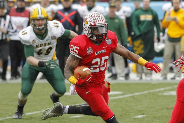 Illinois State running back Marshaun Coprich (25) carries the ball against North Dakota State during the FCS Championship NCAA college football game Saturday, Jan. 10, 2015, in Frisco, Texas.   North Dakota State won the game 29-27 for their fourth straight national championship.  (AP Photo/Tim Sharp)