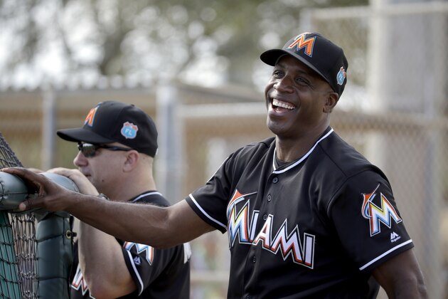Miami Marlins hitting coach Barry Bonds  watches spring training baseball batting practice Monday, Feb. 22, 2016, in Jupiter, Fla. (AP Photo/Jeff Roberson)