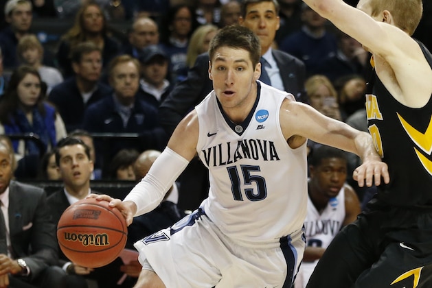 Villanova guard Ryan Arcidiacono (15) drives around Iowa guard Mike Gesell (10) during the second half of a second-ound NCAA men's college basketball tournament game, Sunday, March 20, 2016, in New York. Villanova defeated Iowa 87-68. (AP Photo/Kathy Willens)