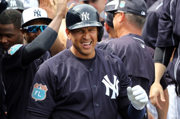CLEARWATER, FL- MARCH 03:  Alex Rodriguez #13 of the New York Yankees celebrates with teammates after hitting a two run home run in the first inning during the game against the Philadelphia Phillies at George M. Steinbrenner Field on March 3, 2016 in Clearwater, Florida.  (Photo by Justin K. Aller/Getty Images)