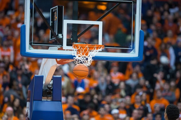SYRACUSE, NY - FEBRUARY 14:  A basketball goes through the hoop during the game between the Syracuse Orange and the Duke Blue Devils on February 14, 2015 at The Carrier Dome in Syracuse, New York.  Duke defeats Syracuse 80-72.  (Photo by Brett Carlsen/Getty Images)