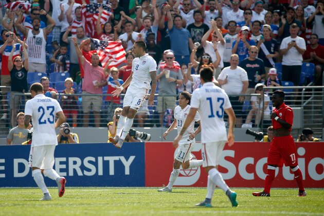 BALTIMORE, MD - JULY 18: Clint Dempsey #8 of USA celebrates after scoring a first half goal against Cuba during the 2015 CONCACAF Gold Cup quarterfinal match at M&T Bank Stadium on July 18, 2015 in Baltimore, Maryland.  (Photo by Rob Carr/Getty Images)